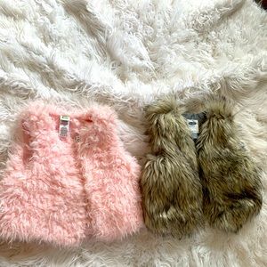 Two toddler fur vests